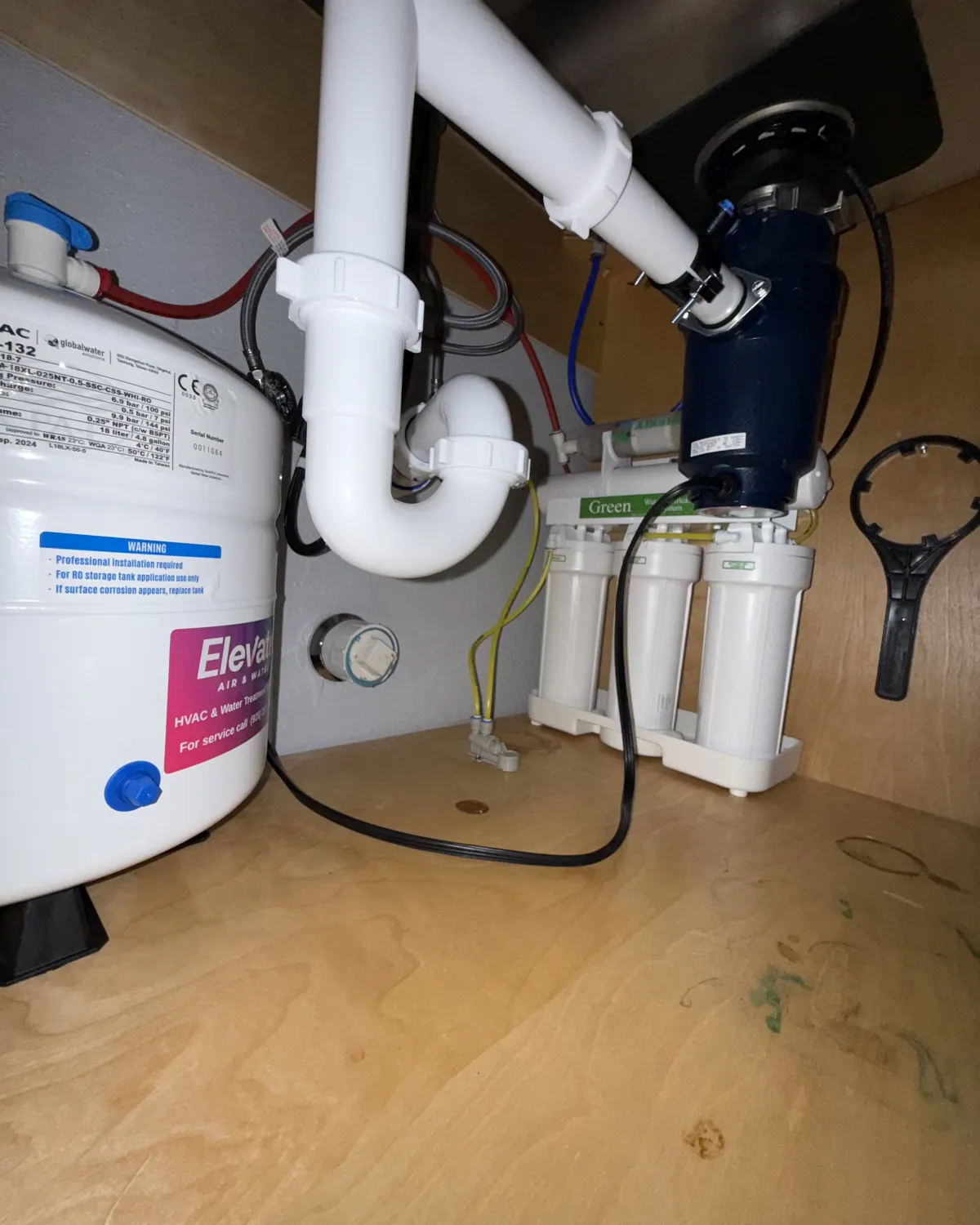 Under-sink reverse osmosis system installed by Elevate