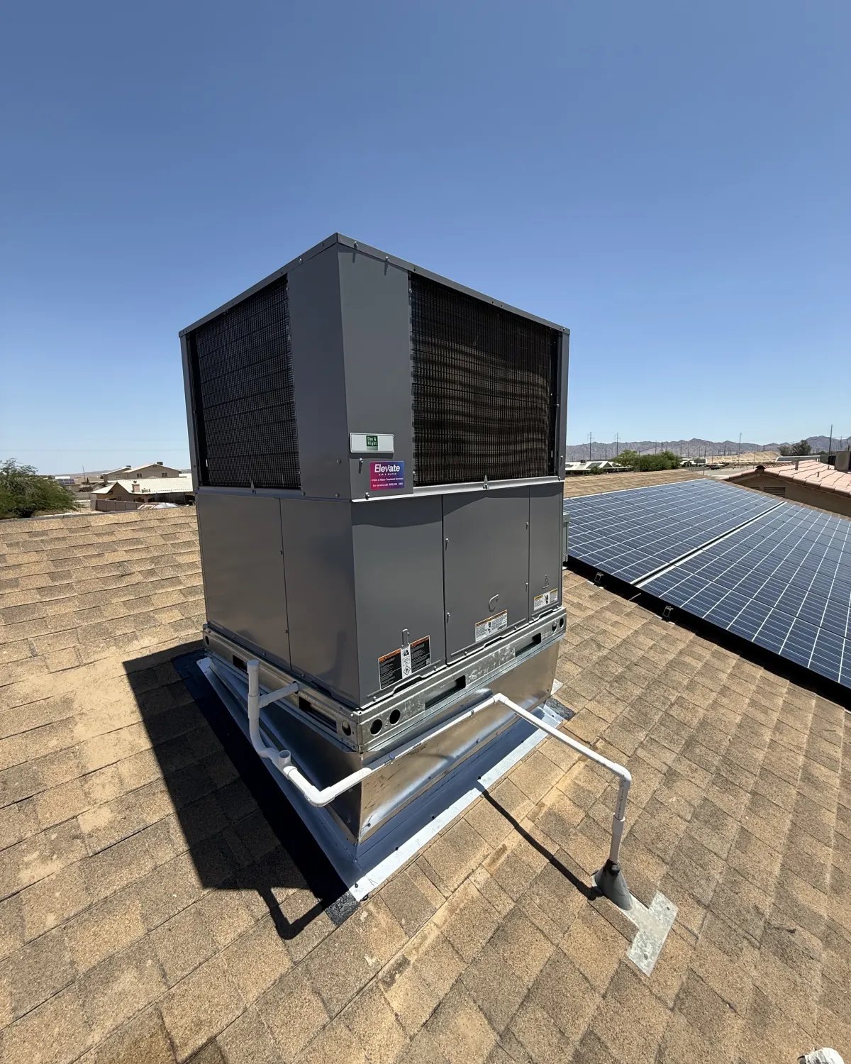 Rooftop packaged HVAC unit installed by the Elevate team